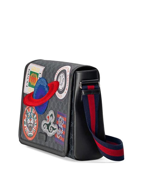 gucci messenger bag with patches.